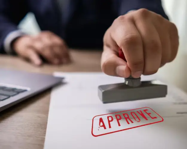 Approved building plan documents and stamps